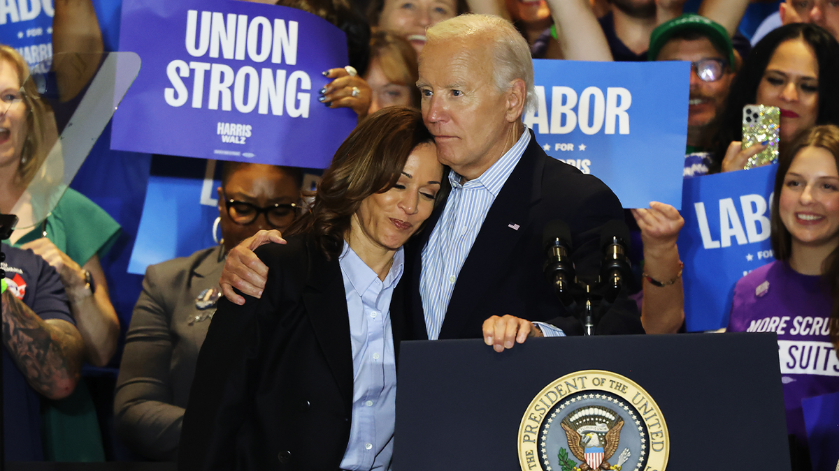 VP Kamala Harris has her head on President Biden's shoulders at a union campaign event